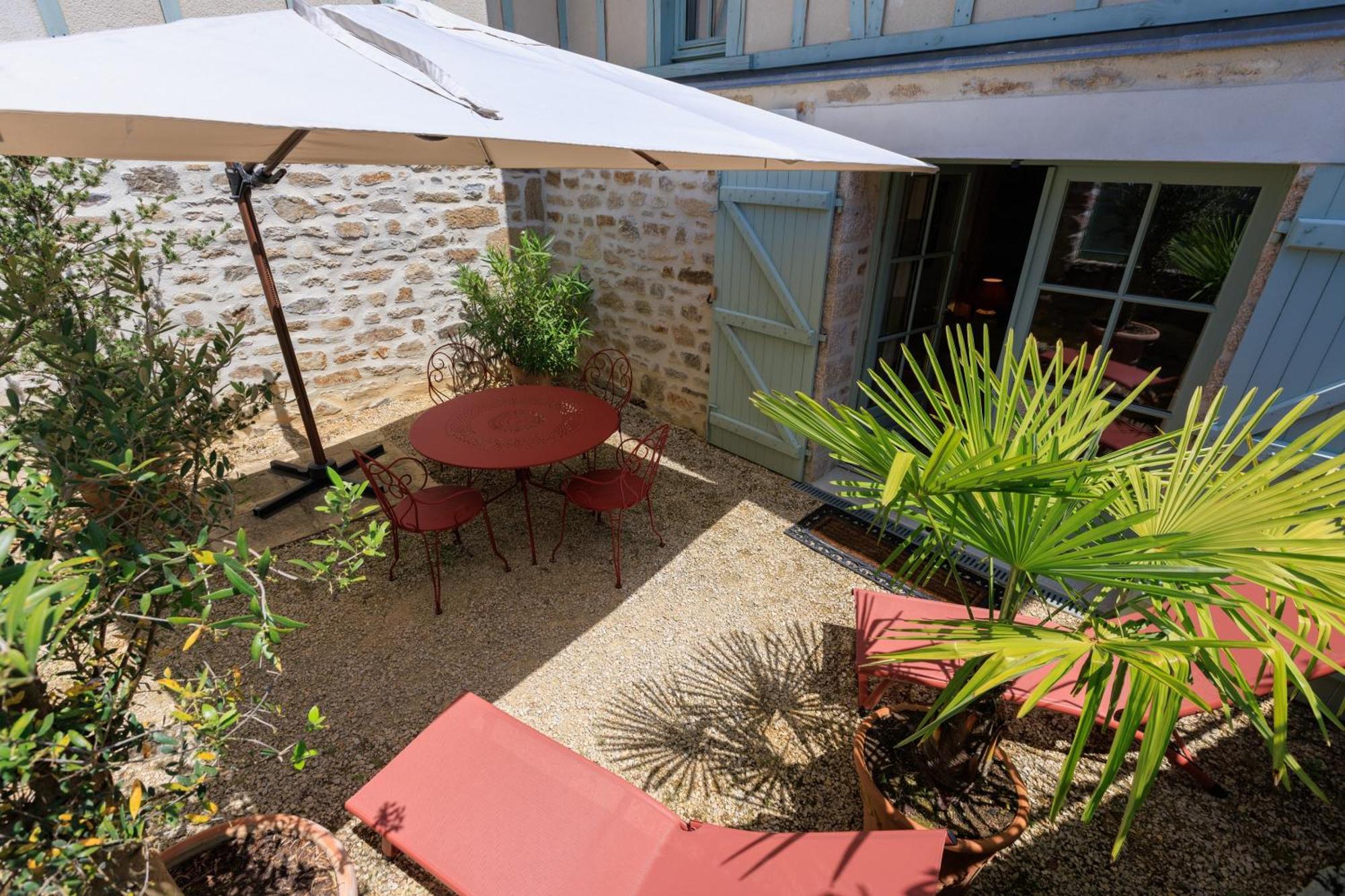 Maison D'Hotes Les Jardins Saint Eloi Le Lonzac Bagian luar foto